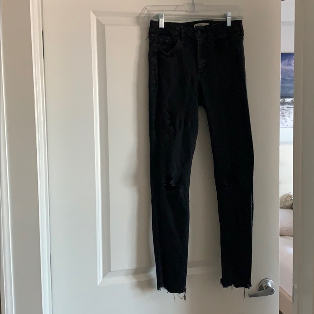Black distressed skinny jeans